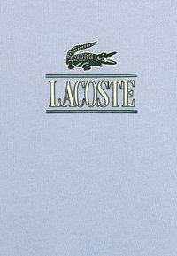 Lacoste Sweatshirt - bleu clair