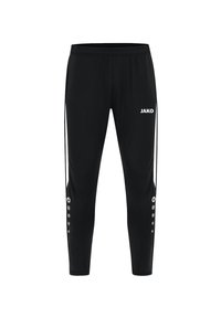 Pantalons de sport noirs au design fuselé, avec une taille élastique, le logo "JAKO" en blanc et des rayures latérales blanches avec des accents circulaires.