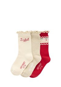 Set von drei Socken: cremefarben mit "Joyful" Text, beige mit einem subtilen Schimmer und rot mit dekorativem Schneeflockenmuster. Alle haben einen gerafften Rand.