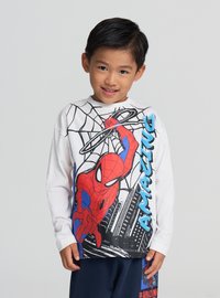 Biała koszulka z długim rękawem z grafiką kreskówkowego Spider-Mana w kolorach czerwonym i niebieskim, z czarnym wzorem pajęczyny oraz napisem "AMAZING" w kolorze niebieskim.