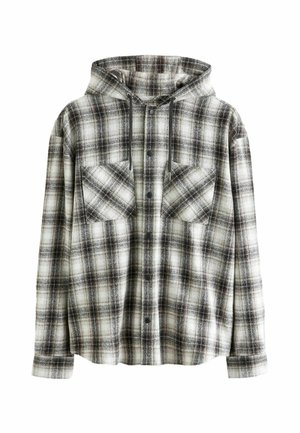 Hooded flannel shirt in black and white plaid. Features two chest pockets, button closure, and drawstrings at the hood. Soft texture.