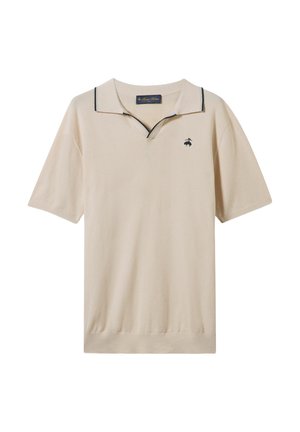 Beige poloshirt met korte mouwen, een v-hals en een contrasterende donkere kraagafwerking. Bevat een klein geborduurd logo op de borst.