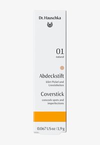 Dr. Hauschka Coverstick, white packaging with orange accent, features the text "Abdeckstift 01 natural," designed to conceal spots and imperfections.