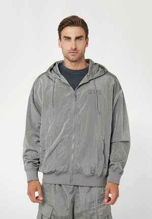 EFFETTO STROPICCIATO - Sweat à capuche - grau