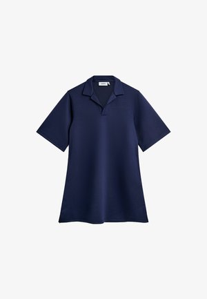 Jūras spēku polo krekls, īsas piedurknes, mīksts materiāls, apkakles kakls ar V-griezumu, taisns apakšmala. Minimalistisks dizains, nav redzamu rakstu vai akcentu.