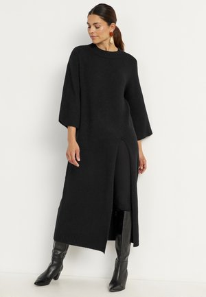 WITH HIGH SLIT - Stickad klänning - black