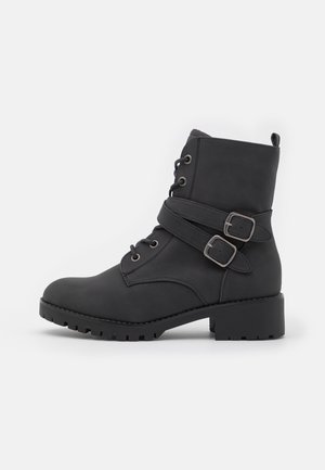 Bottines à lacets - black