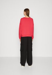 MSCH Copenhagen Melegítőfelső - rose red