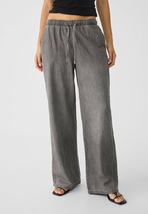 Vaqueros a campana - grey denim