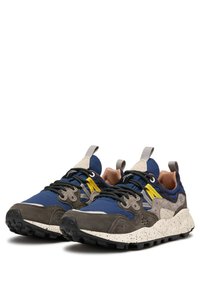 Blue and gray sneaker with a textured upper, featuring yellow accents, a speckled white and black sole, and black laces.