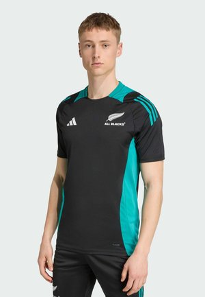 Zwart sport t-shirt met turquoise zijkanten, voorzien van korte mouwen, een ronde halslijn en witte logo-accenten. Gemaakt van ademend materiaal.