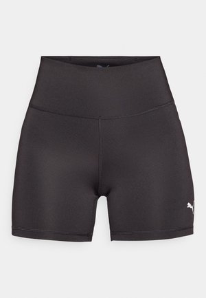 Black athletic shorts made of smooth, stretchy fabric. High-waisted design with flat seams and a small white Puma logo on the side.