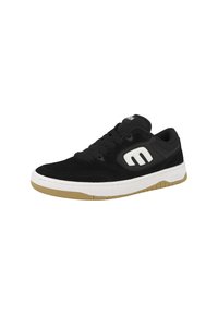 Black sneaker with suede and mesh upper, white rubber sole, and gum rubber outsole. Features round laces and notable white logo on side.