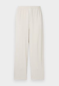 Beige geribde wijde broekspijpen met een elastische tailleband. Heeft verticale strepen en een zachte, gestructureerde stof.