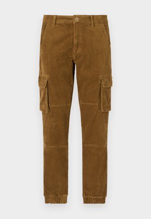 Pantaloni cargo din catifea de culoare maro, cu o croieli ajustată, dotati cu buzunare laterale, închidere cu nasture și manșete elastice la glezne.