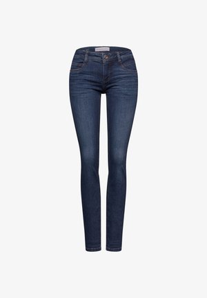 Jeans skinny de mezclilla azul oscuro con una cintura de altura media, cinco bolsillos y un cierre clásico de botón y cremallera. Textura suave y forma ajustada.
