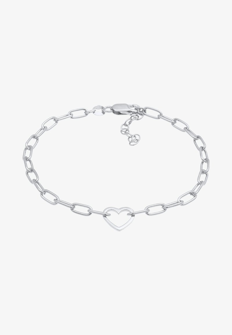 Bracelet chaîne en argent avec des maillons allongés et un pendentif creux en forme de cœur au centre, fixé avec un fermoir mousqueton et une chaînette de rallonge.