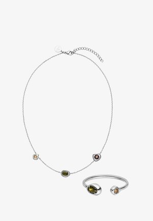 Silver necklace and open silver ring each set with small round green, brown, and light orange gemstones on thin chain and band.