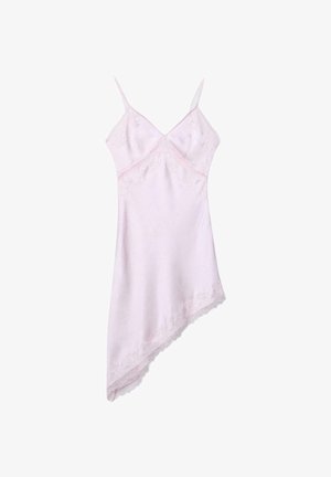 Light pink asymmetrical slip dress with thin straps and lace trim on neckline and hem.