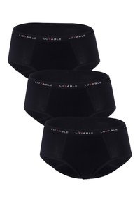 Slippini neri in cotone con una ampia fascia elastica che presenta il nome del marchio "LOVABLE" in lettere bianche e rosse. Tre paia esposti.