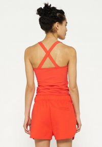 10DAYS Top - poppy red
