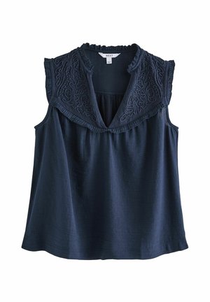 Marineblaue ärmellose Bluse mit besticktem Passe, Rüschen am Kragen und an den Armlöchern, lockere Passform, strukturierter Stoff.