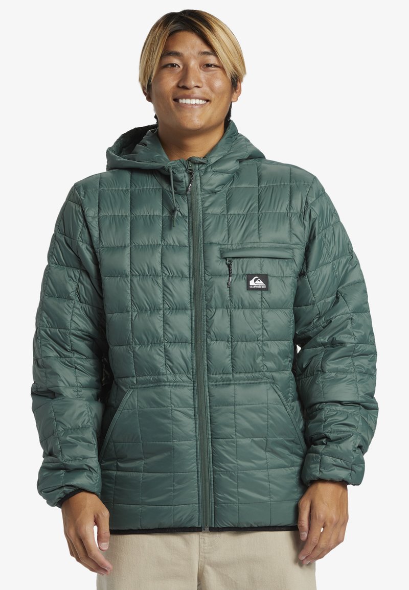 Green, quilted puffer jacket with a hood, featuring a zippered front, chest pocket, and side pockets. Smooth, shiny texture.