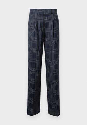 Bukser med marineblå mønster som har et geometrisk design, laget av myk stoff med løs passform og frontfolder.