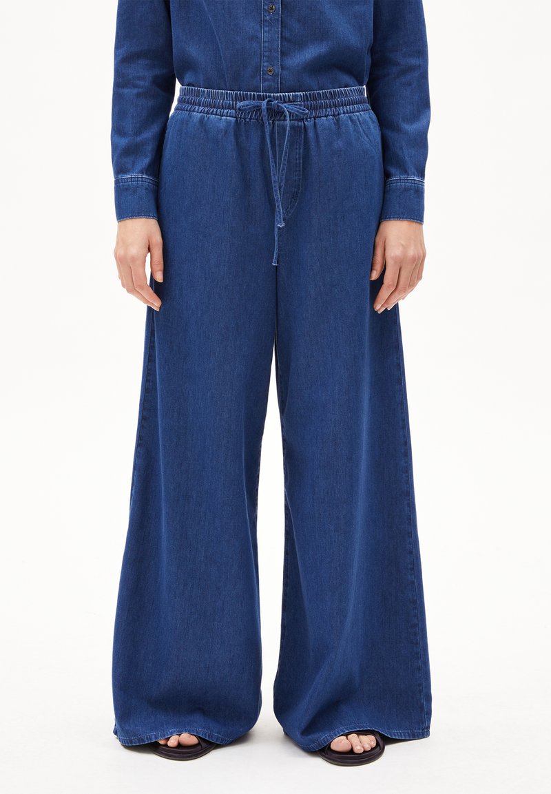 Wijde denim broek in donkerblauw, met een elastische tailleband met trekkoorden, een gladde textuur en een relaxte pasvorm.