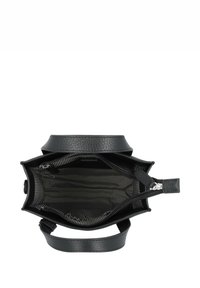 Black leather handbag with a textured exterior. Interior features a striped lining and zippered pocket. Magnetic closure and short handle.