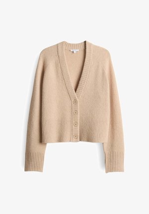 Cardigan cropped beige realizzato in morbida lana. Presenta un collo a V, polsini a coste e una chiusura con bottoni sulla parte anteriore con cinque bottoni rotondi beige.