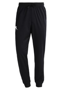 Schwarze sportliche Jogginghosen mit elastischem Bund, Kordelzug, Seitentaschen und Under Armour-Logo auf dem linken Oberschenkel.