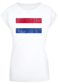 White t-shirt featuring a distressed print of three horizontal stripes: red at the top, white in the middle, and blue at the bottom.