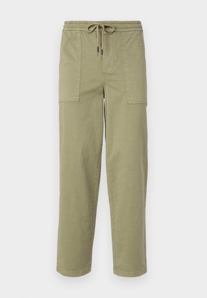 Light olive green pants made of cotton blend fabric, featuring an elastic waistband with drawstring, and two large side pockets.