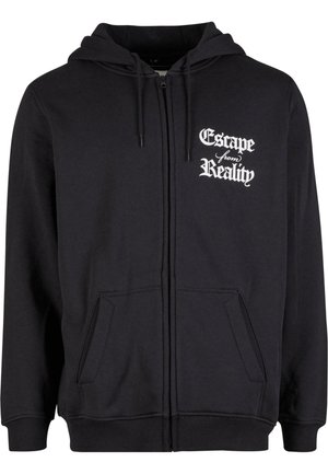 Hoodie noir zippé en tissu doux, avec une poche avant et un texte blanc portant la mention "Échapper à la réalité" sur la poitrine gauche.