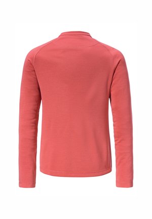 Long-sleeved top in coral color, made of textured fabric. Features a high neck and raglan sleeves with stitched seams.
