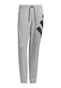 Γκρι φόρμες με ελαστική μέση, κορδόνι και μαύρες διαγώνιες ρίγες στην πλευρά. Κατασκευασμένες από μαλακό, υφασμάτινο ύφασμα.