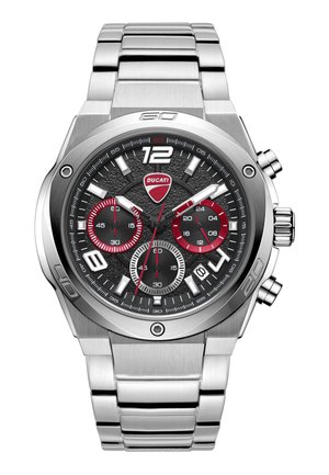 Ruostumattomasta teräksestä valmistettu Ducati-kronografikello, jossa on musta teksturoitu taulu, hopeanväriset ja punaiset pienoisnäytöt, valkoiset merkitsimet ja päivämääräikkuna kello neljän kohdalla.