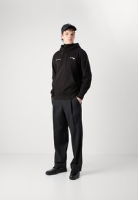 Calvin Klein Jeans 1978 HOODIE - Jersey con capucha - black