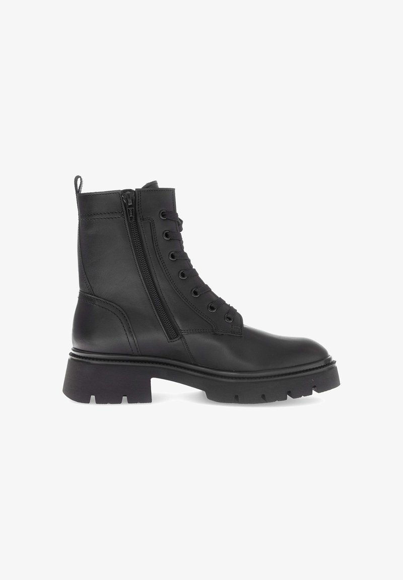Schwarze Lederstiefelette mit schnürbarem Vorderteil, seitlichem Reißverschluss, klobiger Sohle und strukturierten Details. Strukturiertes Design mit abgerundeter Zehenpartie.