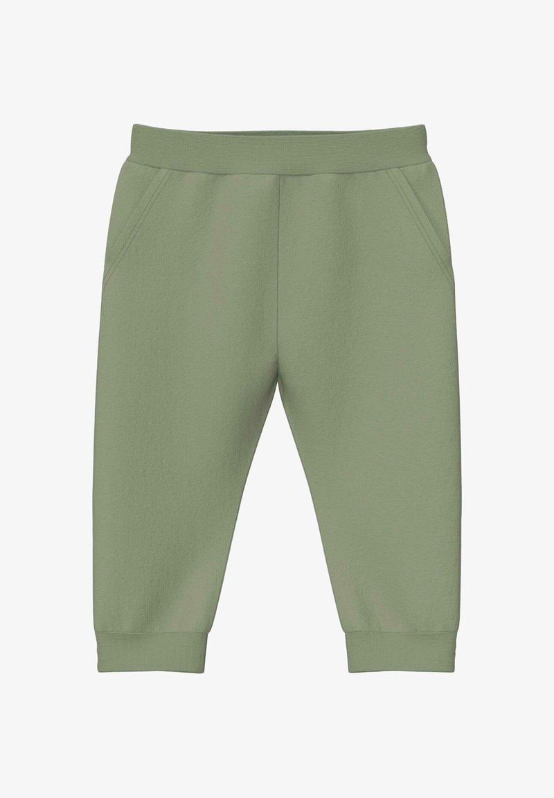 Pantalon de jogging vert clair pour tout-petit avec taille élastique, poches latérales et chevilles resserrées.