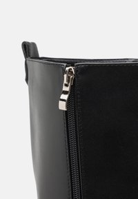 RAID Botas con plataforma - black