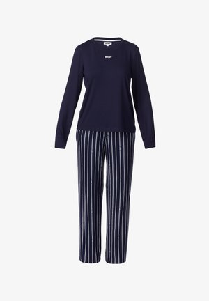 Marineblauwe longsleeve top met DKNY-logo, gecombineerd met marineblauwe rechte broek met witte verticale strepen en verspreide kleine DKNY-logo's.