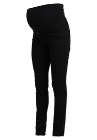 Jeans skinny de maternidade em tecido elástico preto, com uma cintura alta para suporte, corte justo nas pernas e detalhes discretos nos bolsos.