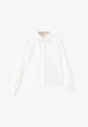 Chemise blanche à manches longues avec un col classique orné de décorations transparentes et des épaules bouffantes. Tissu lisse avec une fermeture boutonnée à l'avant.
