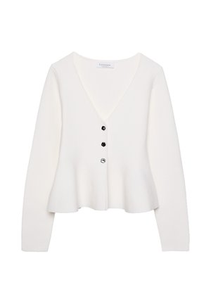 Bela pletena jakna z V-izrezom, dolgimi rokavi in razširjeno spodnjo prejo. Ima tri črne gumbe za zapiranje spredaj.