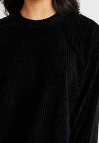 Monki Felpa - black