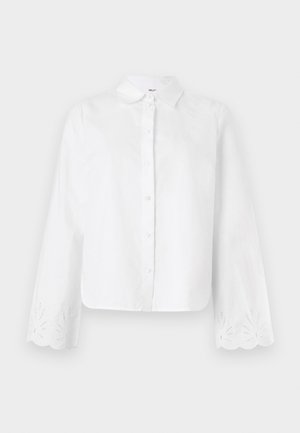 Witte button-up shirt met een puntige kraag, lange mouwen met geschulpte randen en geborduurde bloemmotieven op de manchetten.