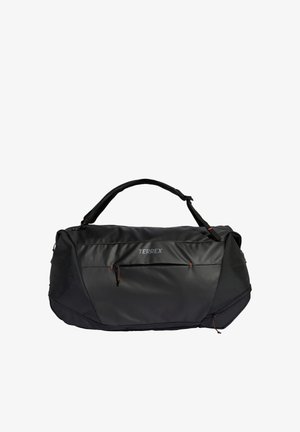 Black travel bag made from durable material with a smooth texture. Features two zippered front pockets and orange accents. Adjustable handle.