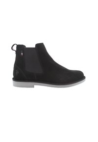 Botas Chelsea de ante negro con paneles elásticos a los lados, una tira de agarre y una suela de goma de contraste. Textura suave con detalles de costura.